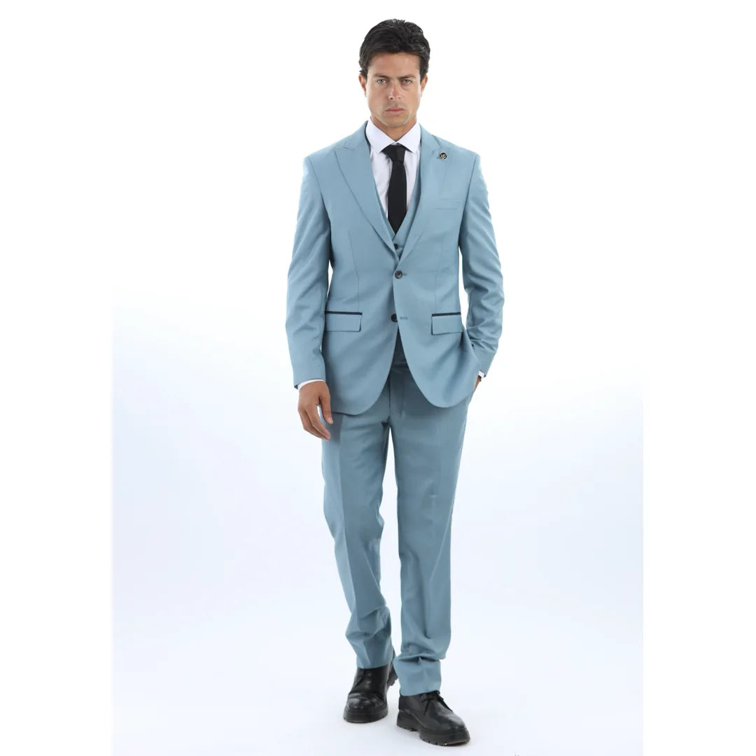 Man wearing a light blue suit with a white shirt and black tie on a white background